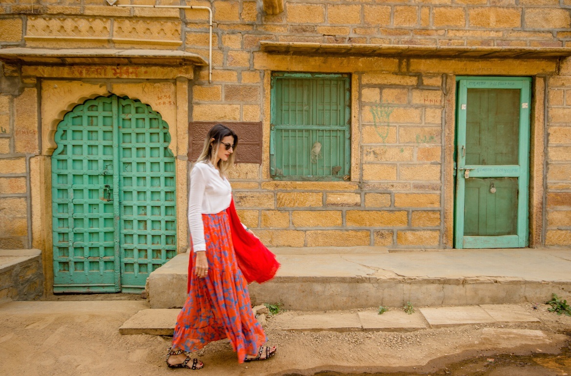 What to wear in India: woman walking in Jaisalmer