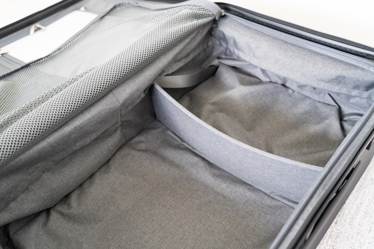 The cloth divider in the larger Voyageur suitcases
