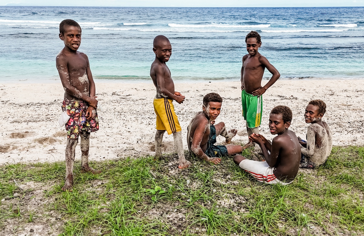 Children playing on the beach in Tanna, Vanuatu
